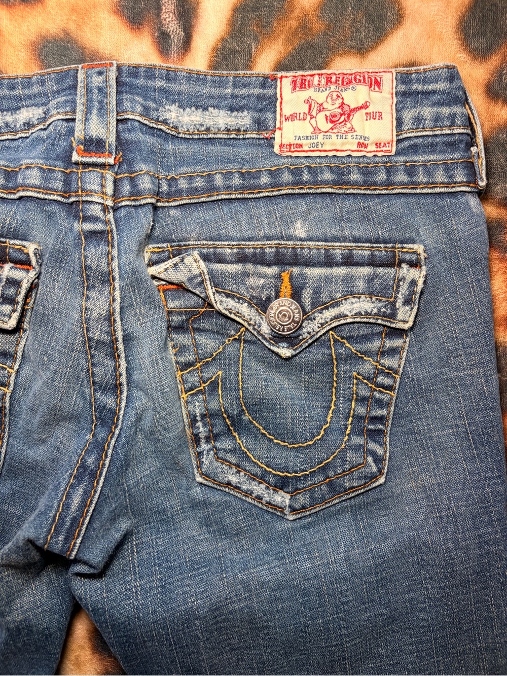 True Religion Women's Medium Blue Boot Cut Jeans with Signature Pocket Stitching